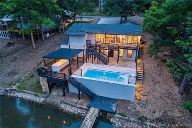 LAKE LIVING AT ITS FINEST! Spectacularly remodeled waterfront - photo 6