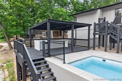 LAKE LIVING AT ITS FINEST! Spectacularly remodeled waterfront - photo 7