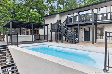 LAKE LIVING AT ITS FINEST! Spectacularly remodeled waterfront - photo 8