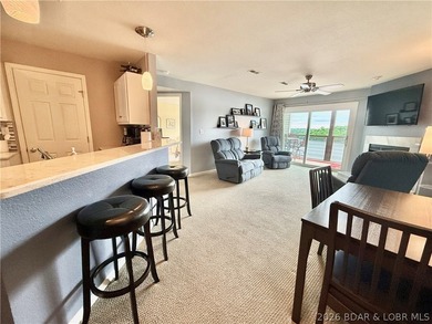 Experience lake life at its finest in this stunning condo - photo 4