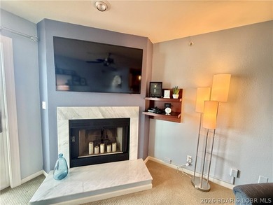Experience lake life at its finest in this stunning condo - photo 7