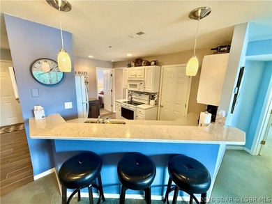 Experience lake life at its finest in this stunning condo - photo 9
