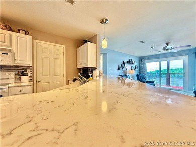 Experience lake life at its finest in this stunning condo - photo 10