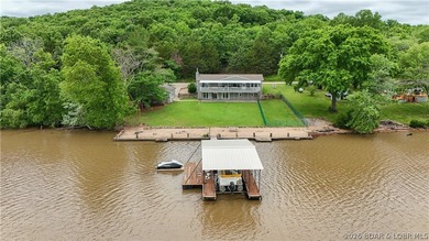 Experience the ultimate Lake of the Ozarks lifestyle with this - photo 2