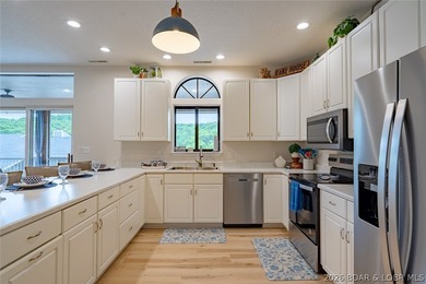 Beautifully updated top floor end unit at Lazy Days in Osage - photo 9