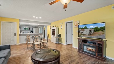 Welcome home to the Osage Vista's community. This top floor unit - photo 4