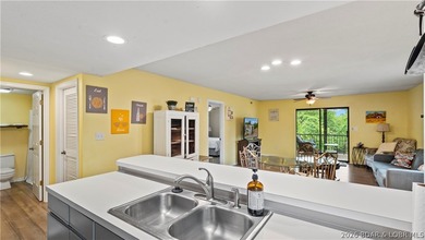 Welcome home to the Osage Vista's community. This top floor unit - photo 8