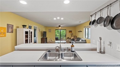 Welcome home to the Osage Vista's community. This top floor unit - photo 9