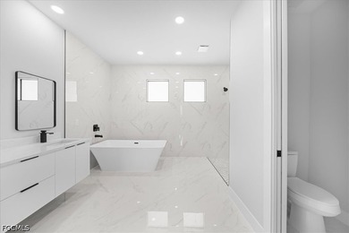 Welcome to this beautifully crafted home where modern luxury - photo 19