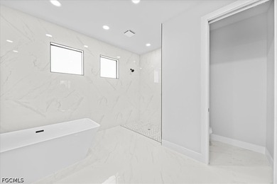 Welcome to this beautifully crafted home where modern luxury - photo 23