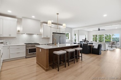 Experience elevated lake living in this new construction villa - photo 1