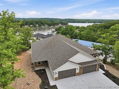 Experience elevated lake living in this new construction villa - photo 5