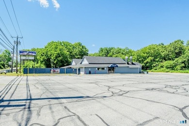 An exceptional opportunity to own both a successful, established - photo 1