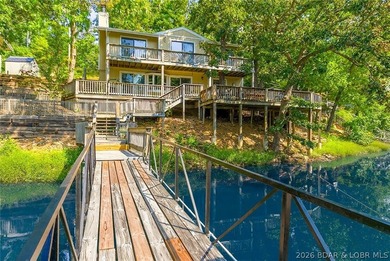 THIS IS IT! Lakefront living at its finest!! This beautifully - photo 1