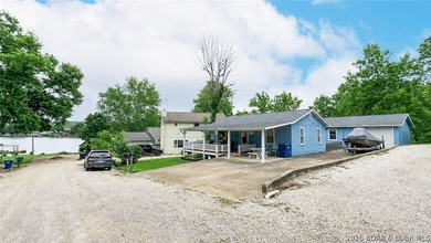 Curated, turnkey, and designed for the ultimate Lake of the - photo 2