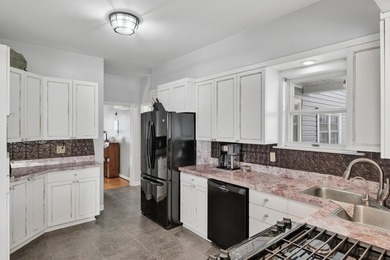 This meticulously maintained, two-story home combines historic - photo 2