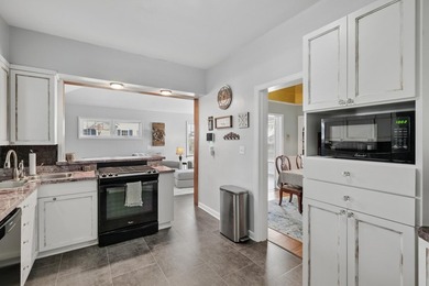 This meticulously maintained, two-story home combines historic - photo 3