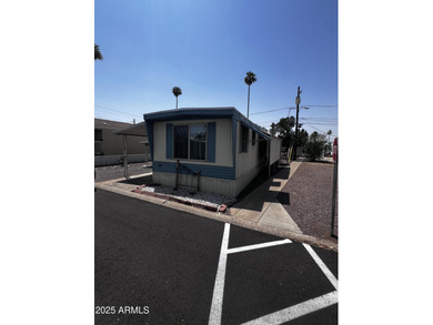 Cozy 2 bedroom /2 bath home with newer A/C Unit, Refrigerator