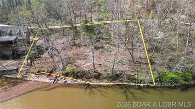 Are you ready to build your dream lake home? This prime piece of - photo 5