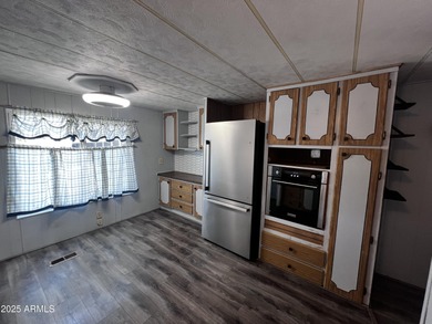 Cozy 2 bedroom /2 bath home with newer A/C Unit, Refrigerator