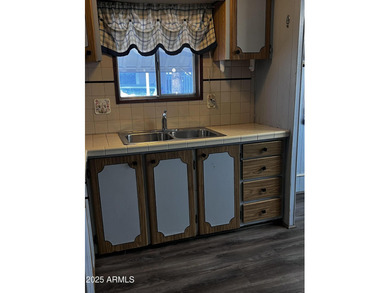 Cozy 2 bedroom /2 bath home with newer A/C Unit, Refrigerator