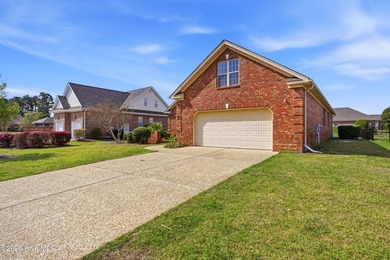 Welcome to this beautifully refreshed brick home in the highly - photo 3