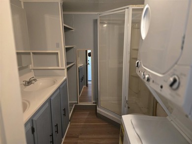 Welcome to this charming 2-bedroom, 1-bath home, ideally located - photo 17