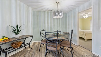 Walk in with no steps and start enjoying the ease of lakefront - photo 3
