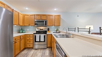 Walk in with no steps and start enjoying the ease of lakefront - photo 6