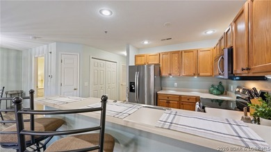 Walk in with no steps and start enjoying the ease of lakefront - photo 7