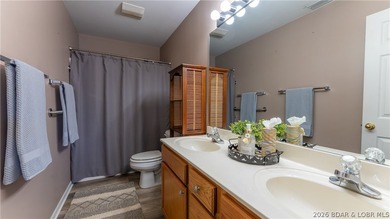 Walk in with no steps and start enjoying the ease of lakefront - photo 10