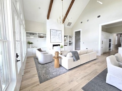 Experience elevated lakefront living in this furnished retreat - photo 16