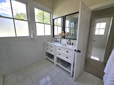 Experience elevated lakefront living in this furnished retreat - photo 24