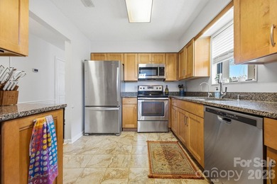 This highly coveted lower-level end unit in the Cloisters - photo 5