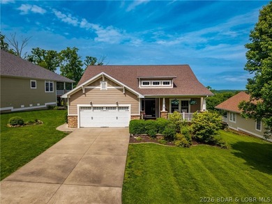 Located in a highly sought-after gated, golf cart-friendly - photo 2