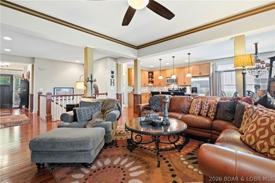 Located in a highly sought-after gated, golf cart-friendly - photo 3