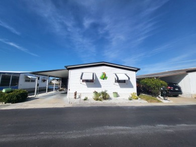 Lake Home For Sale in New Port Richey, Florida