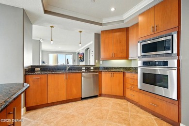 MOTORIZED HURRICANE SHUTTERS! Beautiful end unit condo with - photo 12