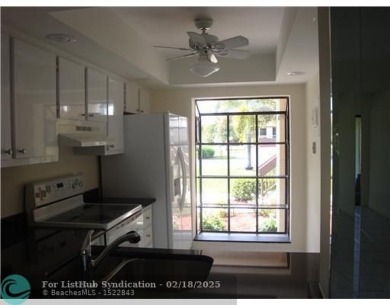 Lake Condo For Sale in Deerfield Beach, Florida