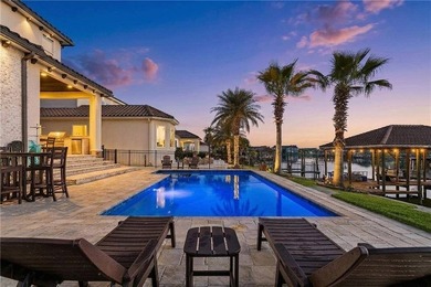 Exceptional 6-year-old custom built waterfront home in the gated - photo 2