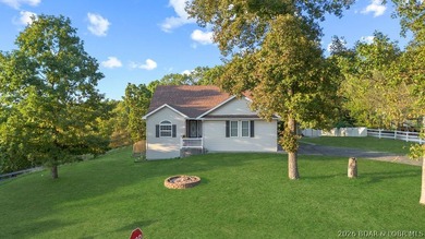 Welcome to this 4-bedroom, 3-bath lake-area-retreat with - photo 1