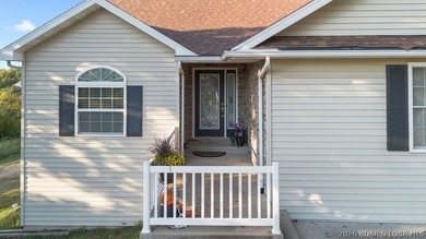 Welcome to this 4-bedroom, 3-bath lake-area-retreat with - photo 3