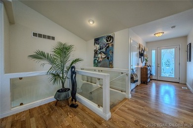 Welcome to this 4-bedroom, 3-bath lake-area-retreat with - photo 6