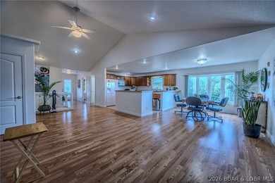 Welcome to this 4-bedroom, 3-bath lake-area-retreat with - photo 8
