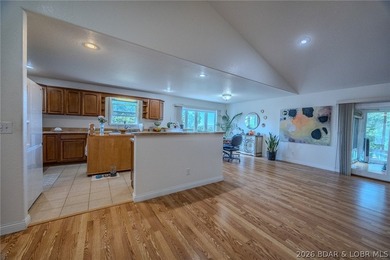 Welcome to this 4-bedroom, 3-bath lake-area-retreat with - photo 9