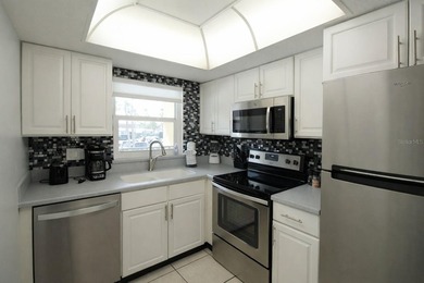 Welcome to Cocoa Beach Club 213 - a beautifully updated - photo 8