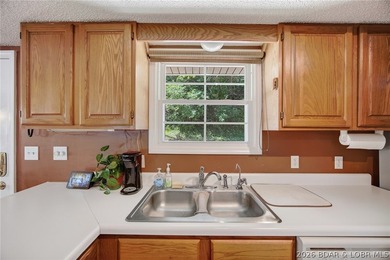 Lakefront living is easy in this 4 bedroom, 2.5 bath home - photo 7