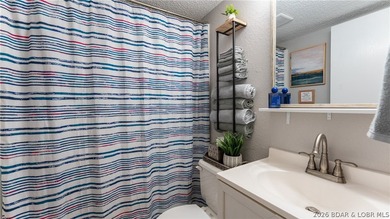 Turn-key lakefront living in the gated Southwood Shores complex - photo 8