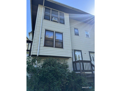 Well-maintained trilevel end-unit townhouse condominium in Fair - photo 1