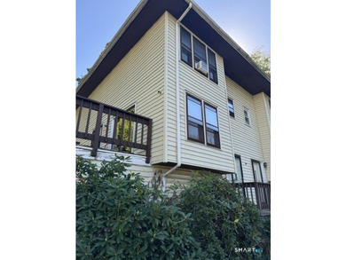 Well-maintained trilevel end-unit townhouse condominium in Fair - photo 2